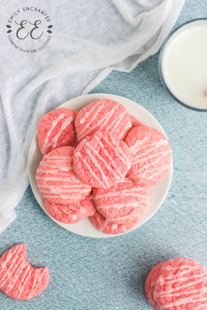 Plate of Strawberry Cake Mix Cookies stacked on top of each other