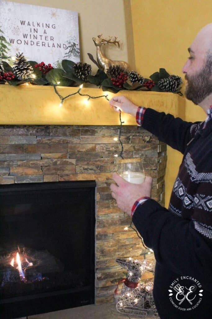 Decorating a fireplace mantle with string of white lights