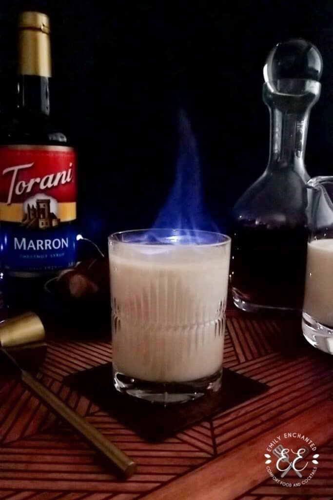 Spiked Eggnog Cocktail set on fire A cocktail lit on fire