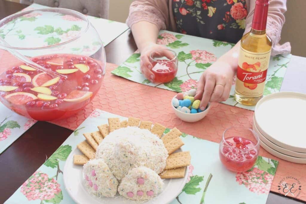 Easter table setting with pink punch and bunny butt cheese ball dessert