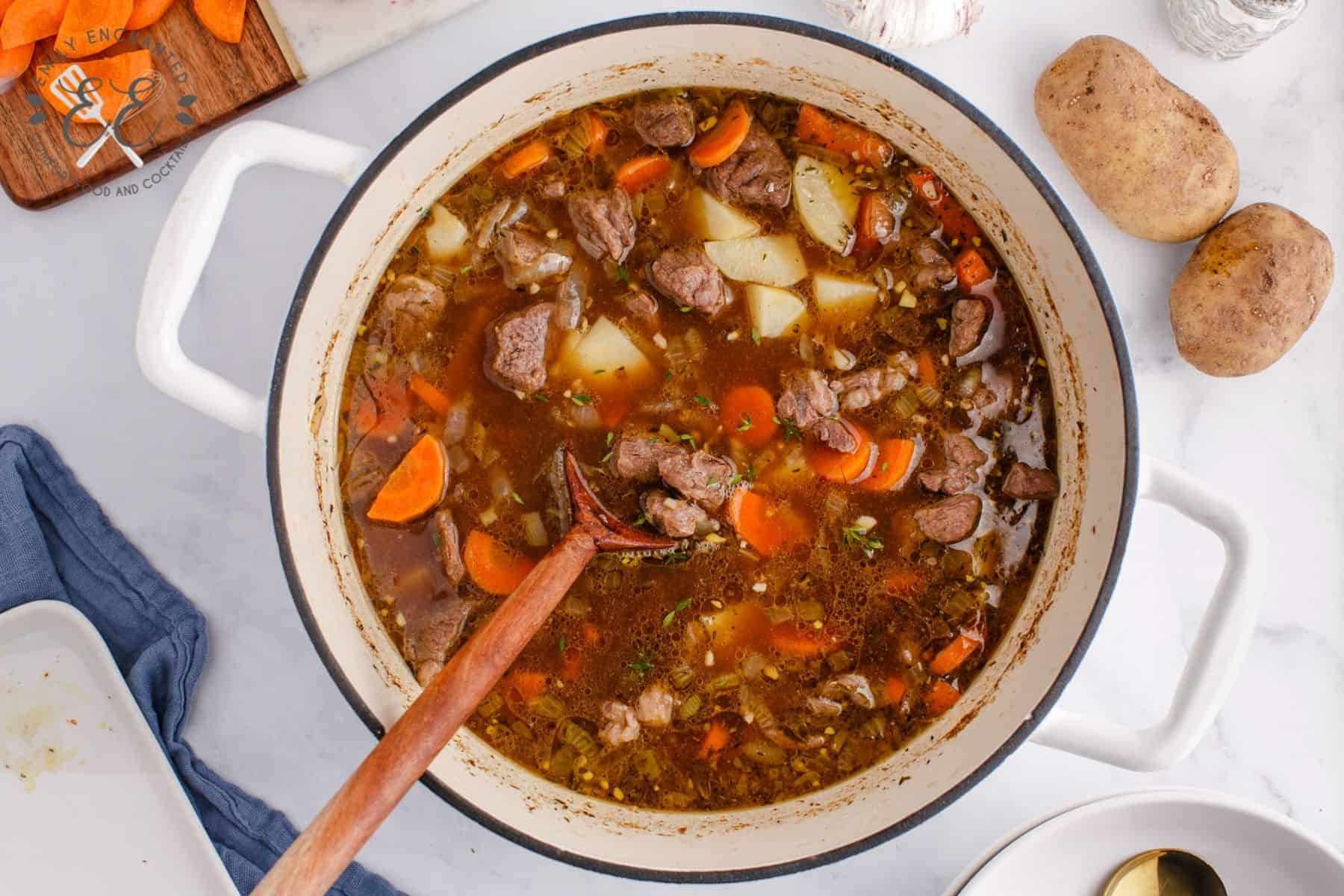 Beef Stew cooking in a dutch oven