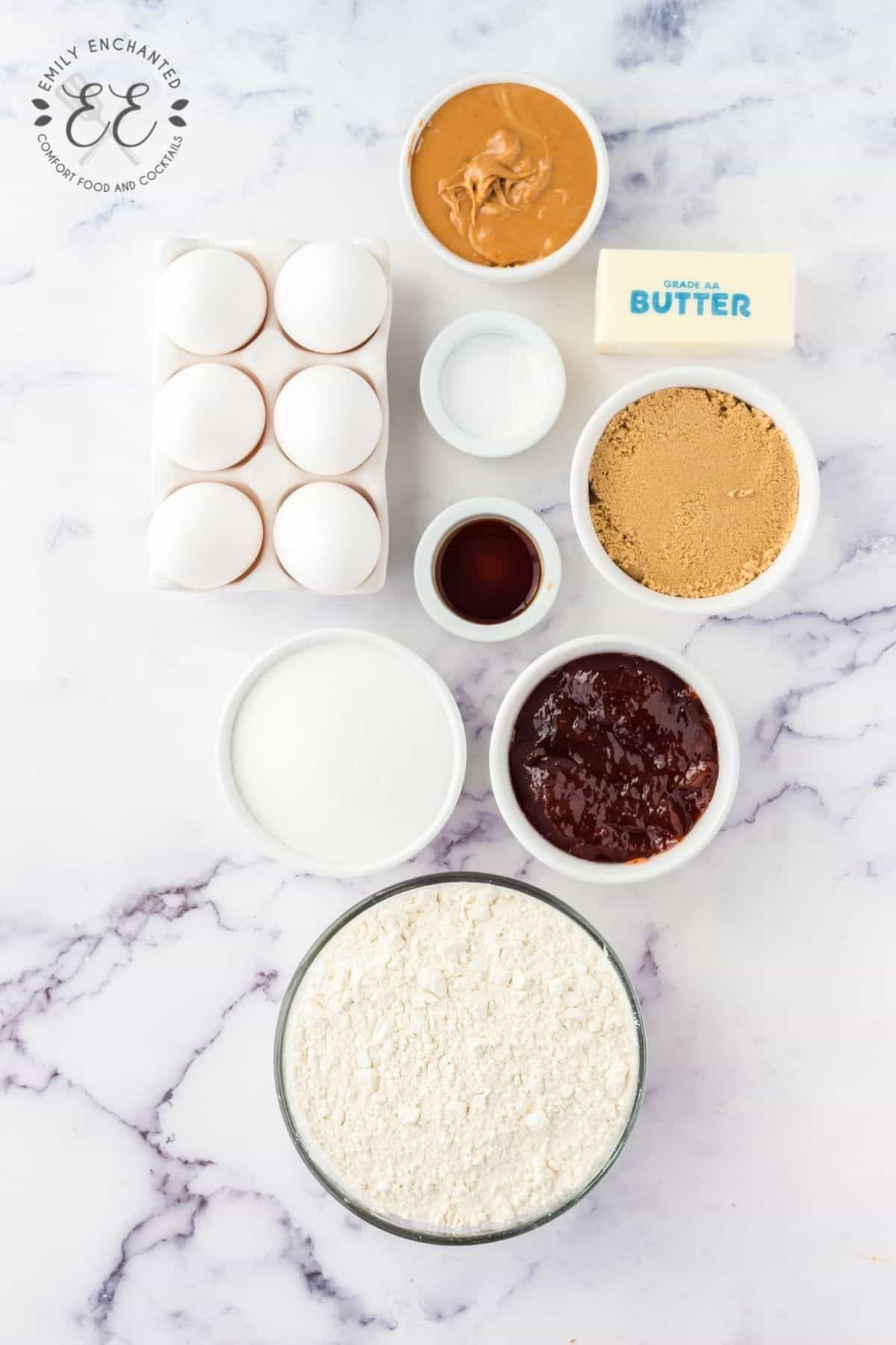 Flat lay of ingredients for peanut butter cookies with jelly on a countertop