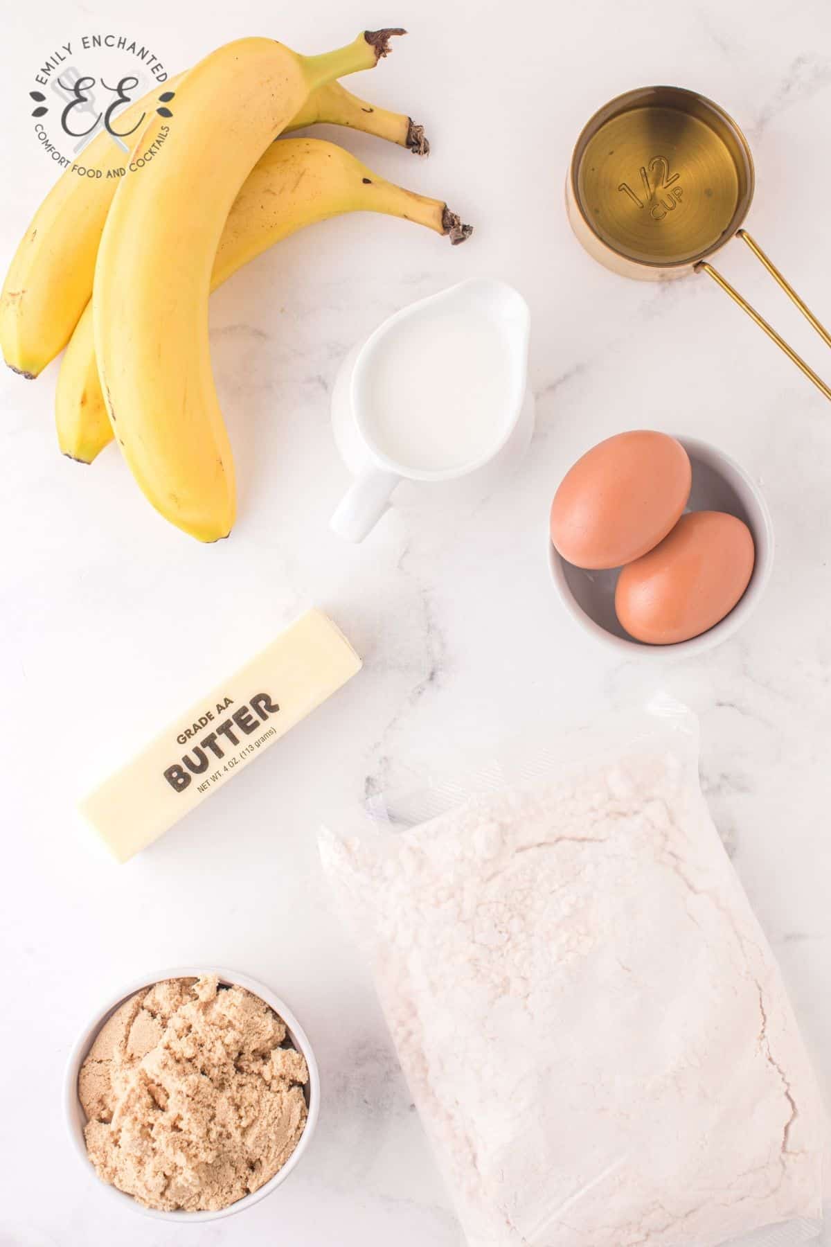 Banana Upside Down Cake Ingredients laid out on a marble surface