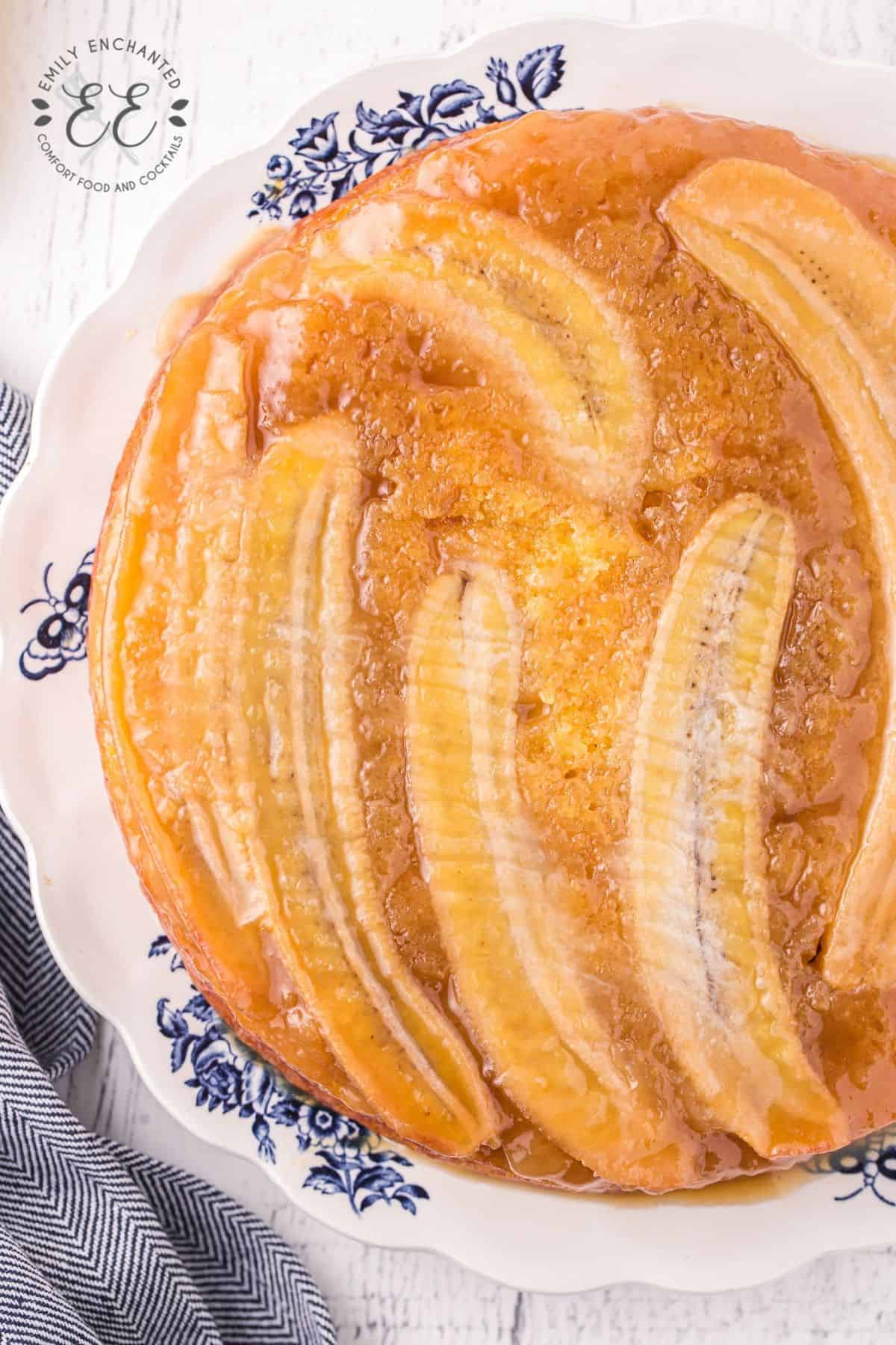 Upside Down Banana Cake on a cake platter