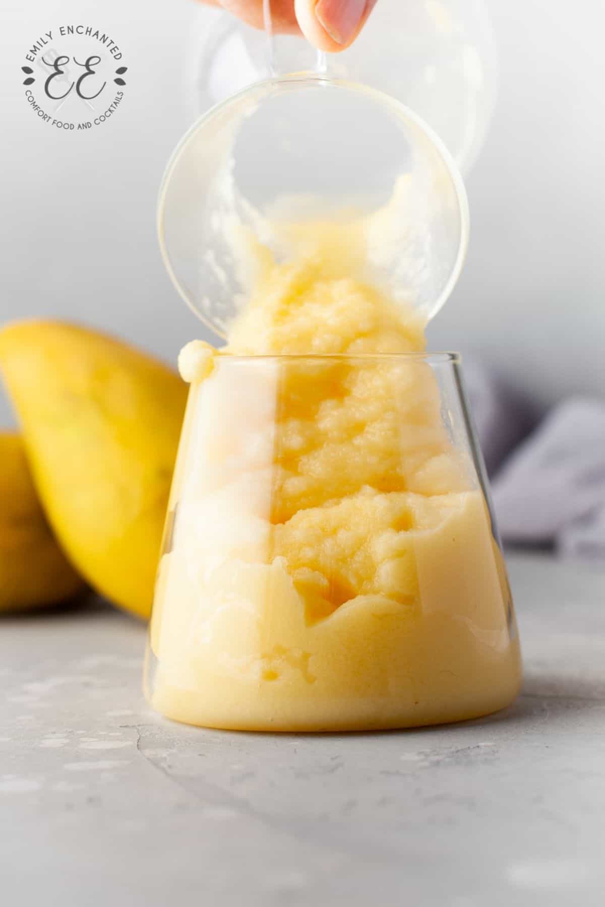 Mango Piña Colada Pouring into glass