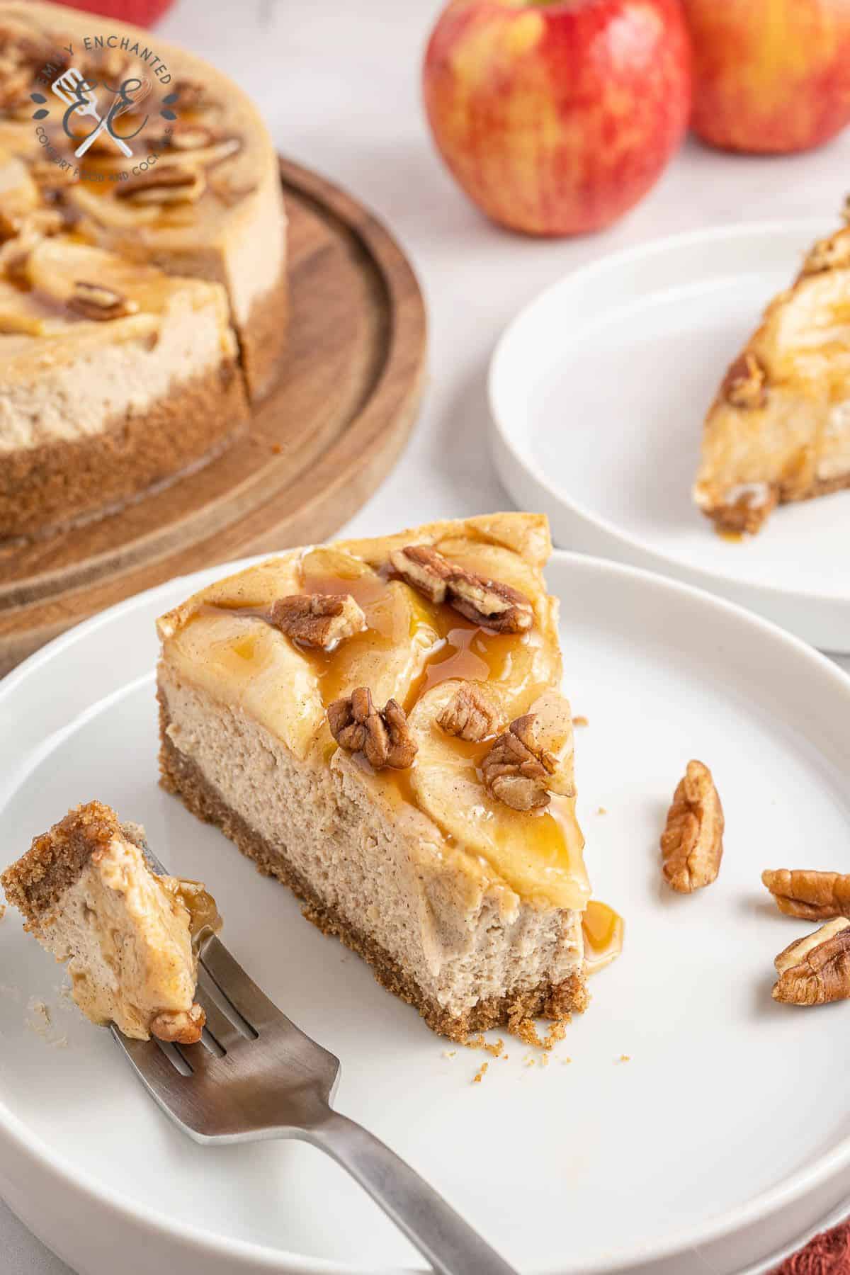 Caramel Apple Cheesecake slice with a bite taken out of it
