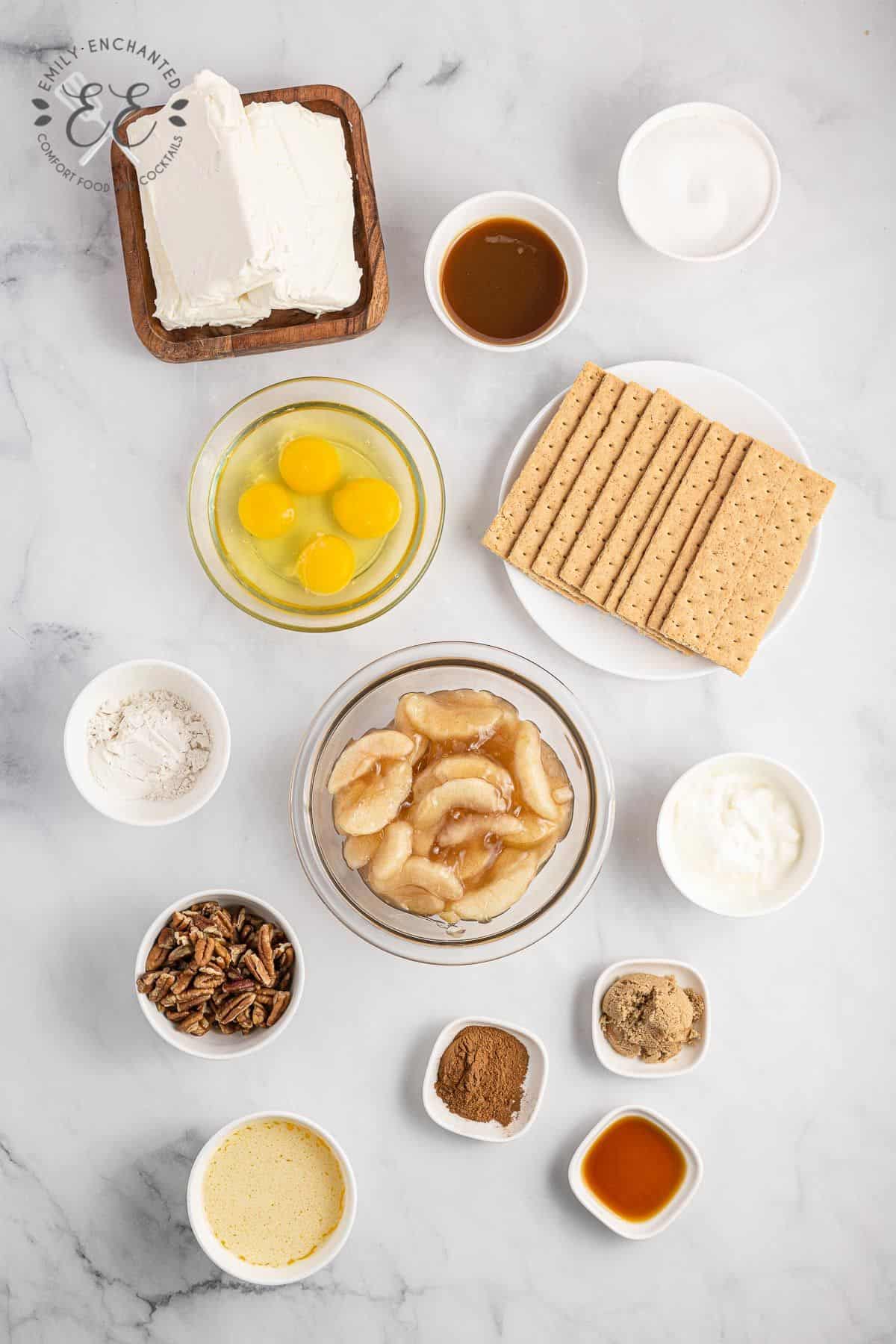 Caramel Apple Cheesecake ingredients in a flay lay on a countertop