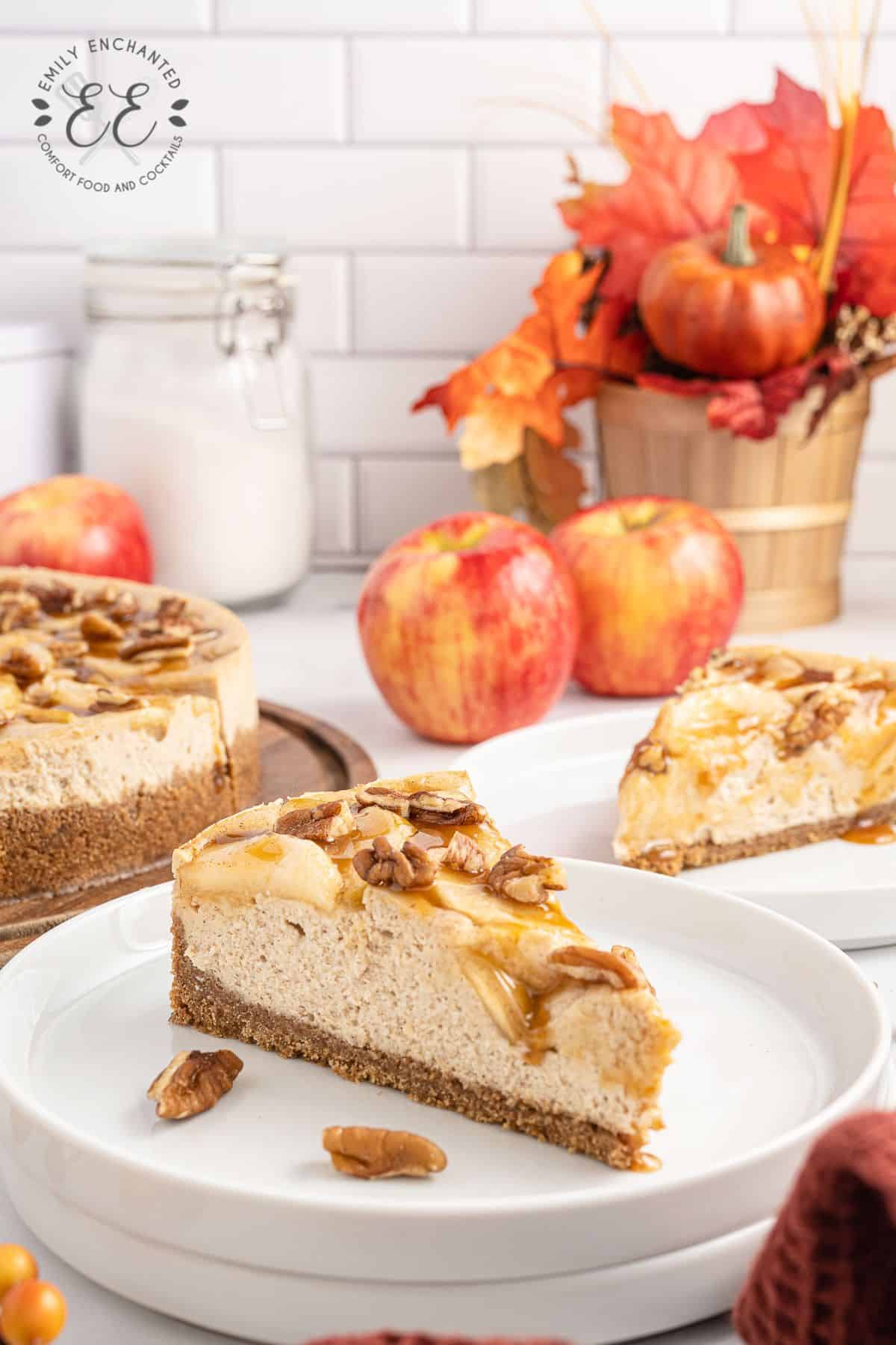 Caramel Apple Cheesecake slice on a white plate