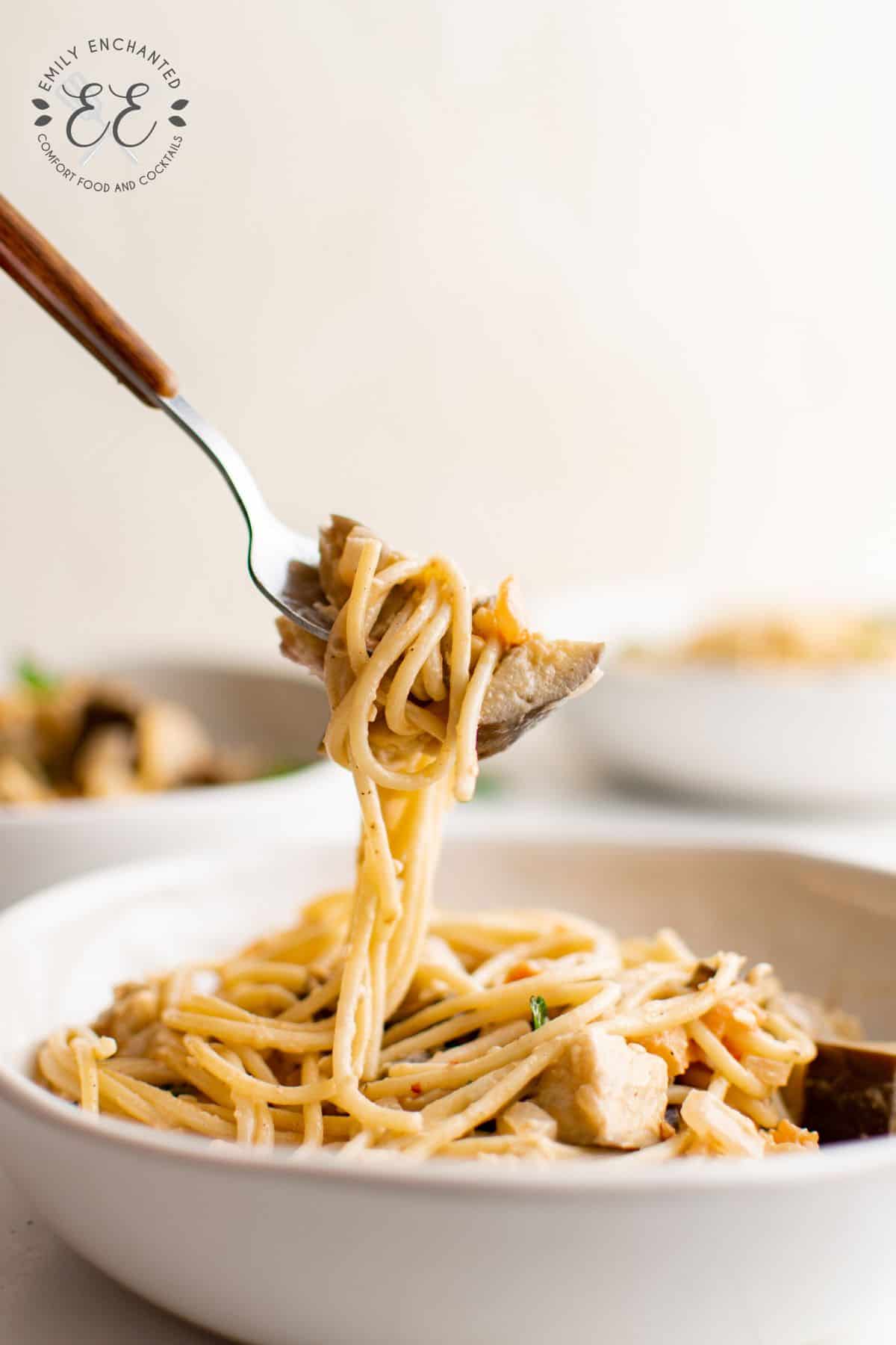 Aubergine pasta on a fork